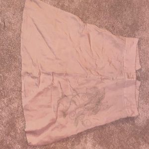 Beige skirt with beautiful flower, design, zipper in the back